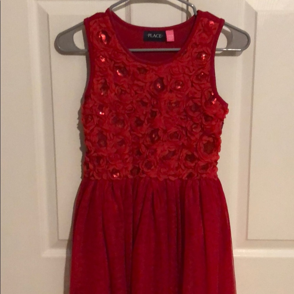 Red sleeveless dress with flower bodice